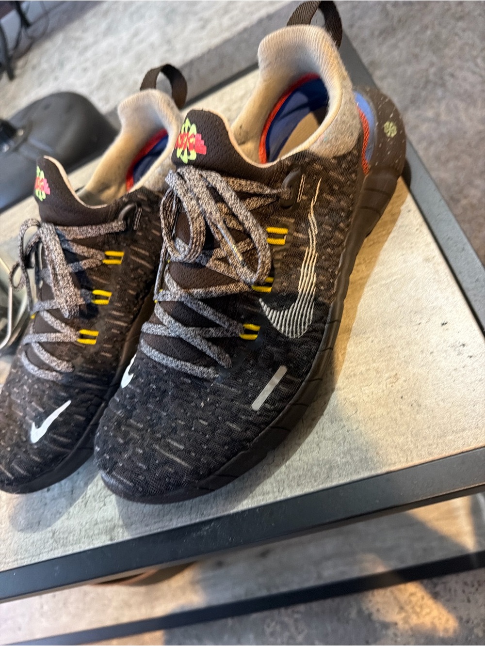 Nike Kids Black Knit Sneakers with White Swoosh and Yellow Accents